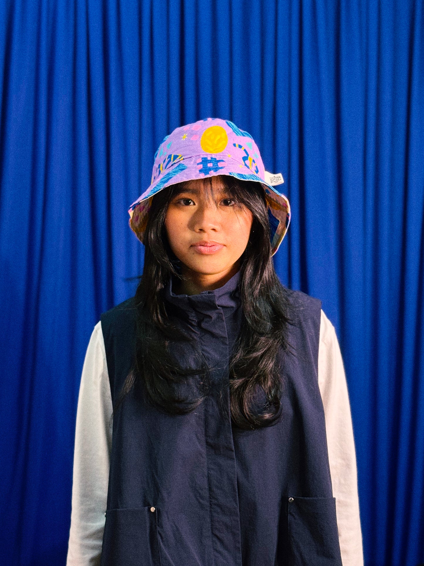 Reversible Bucket Hat in Confetti and Party Poppers