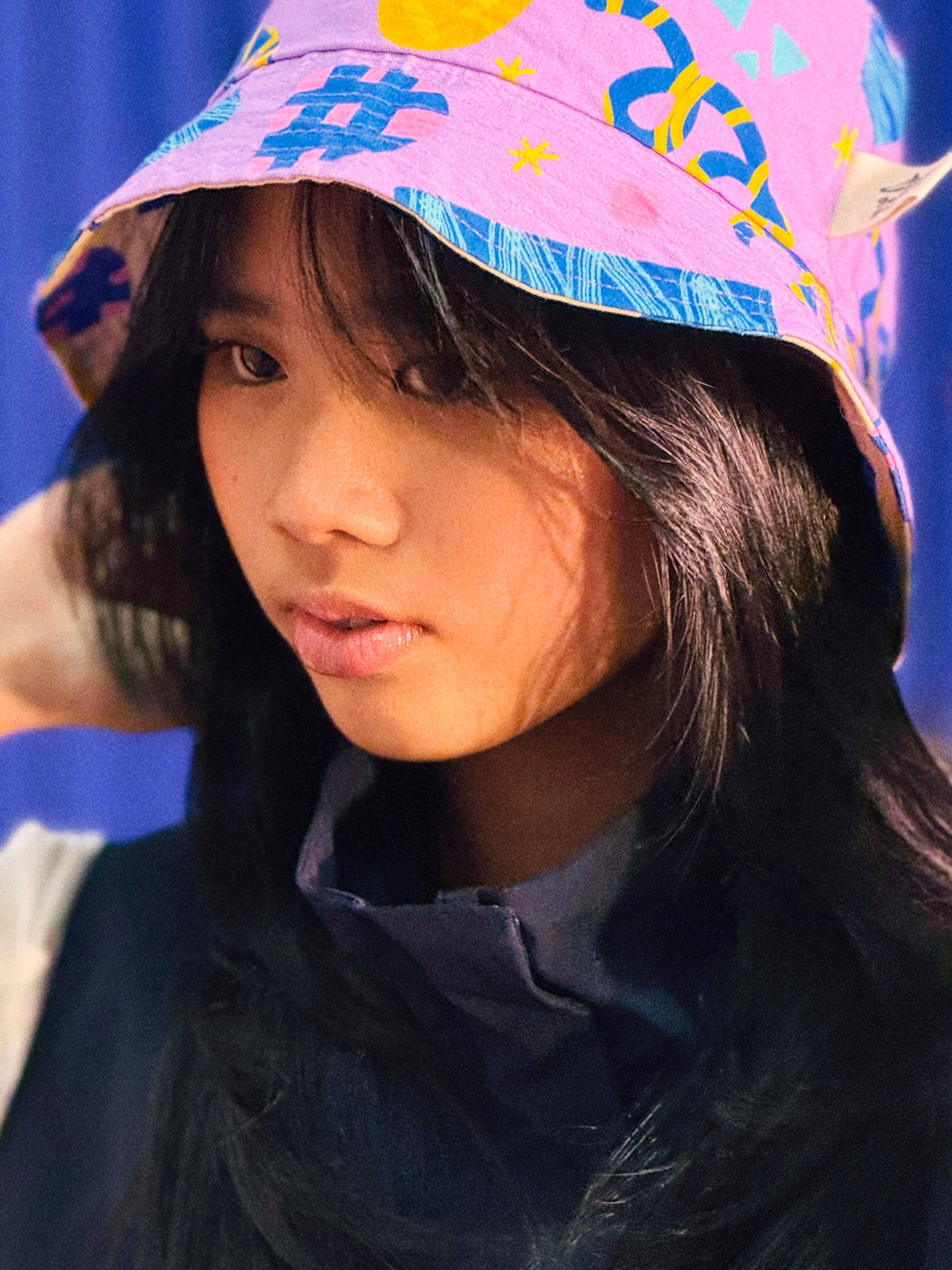 Reversible Bucket Hat in Confetti and Party Poppers