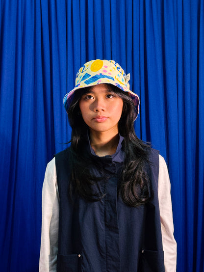 Reversible Bucket Hat in Confetti and Party Poppers