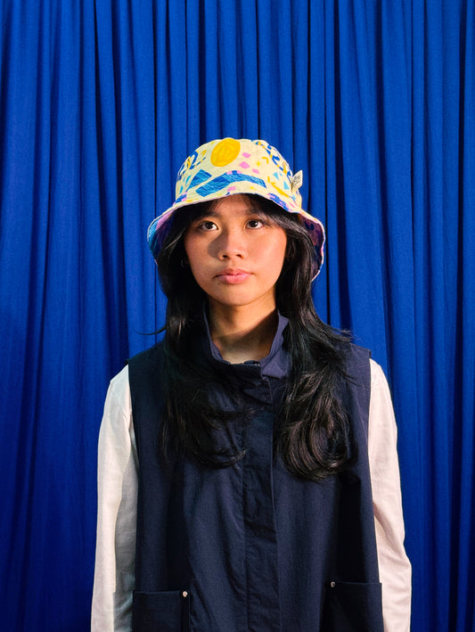 Reversible Bucket Hat in Confetti and Party Poppers